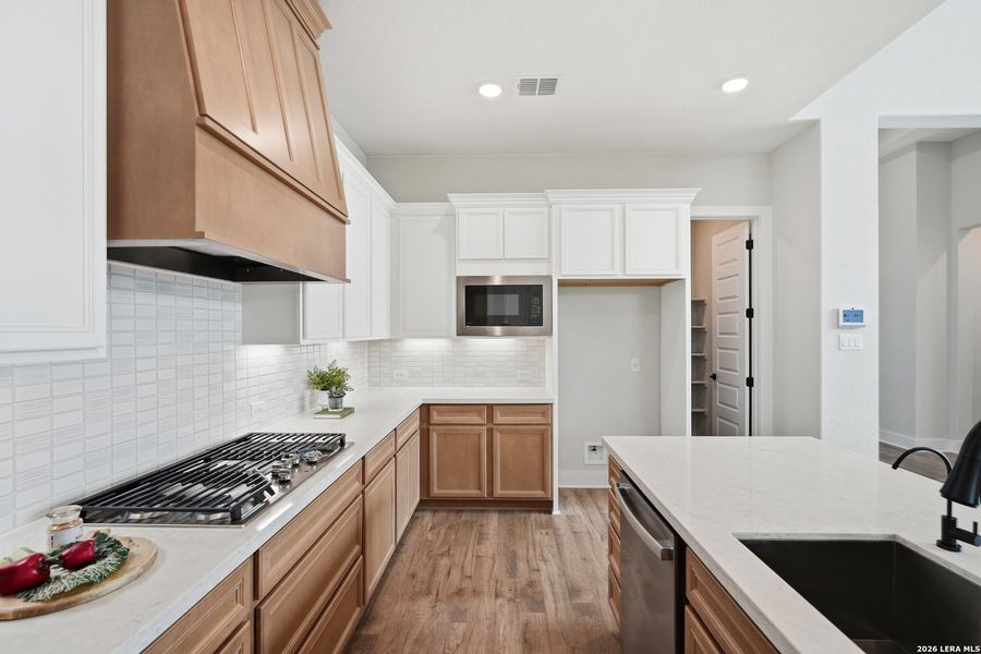 Furnished interior view inside a new home in Potranco Oaks, Castroville (Image 41).