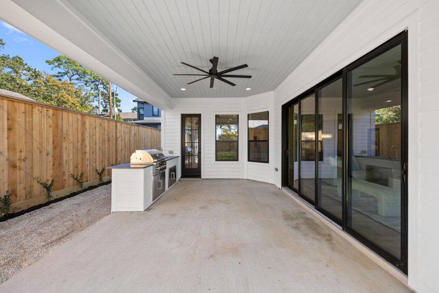 Open the wall of windows on a nice day while you grill and watch the game.