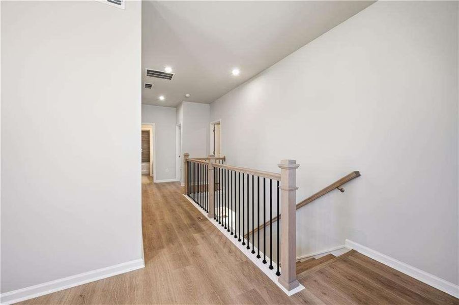 Spacious, unfurnished interior of a new home in The Paddocks at Doc Hughes, Buford (Image 23).