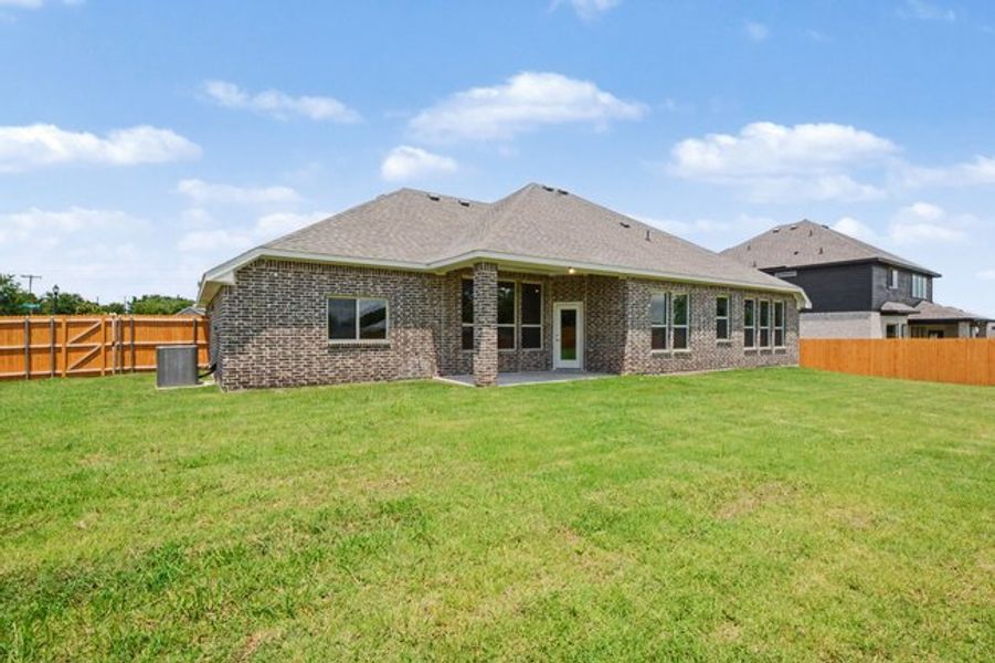 Exterior details and patio area of a home in Cole Crossing Estates, DeSoto (Image 19).