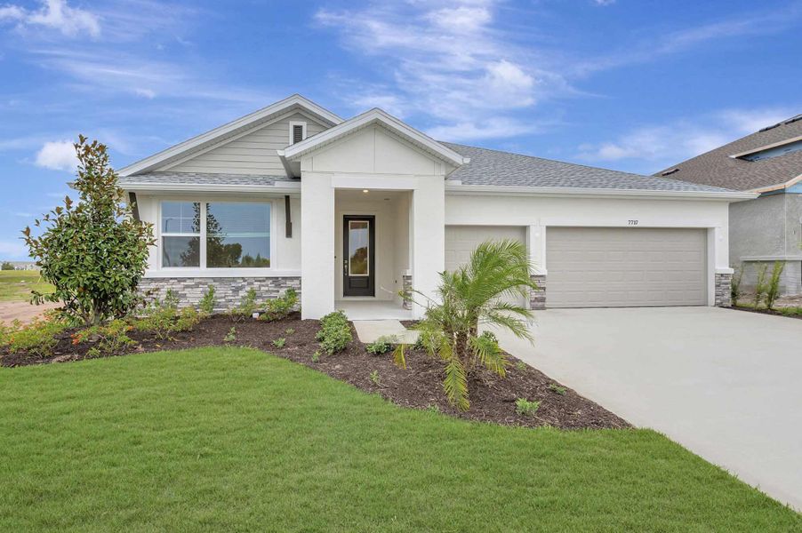 Representative exterior photo of a completed home built from the The Bella Vista by David Weekley Homes in Coasterra, Palmetto, FL (Image 1). Representative exterior photo of a completed home built from the The Bella Vista by David Weekley Homes in Coasterra, Palmetto, FL (Image 1).