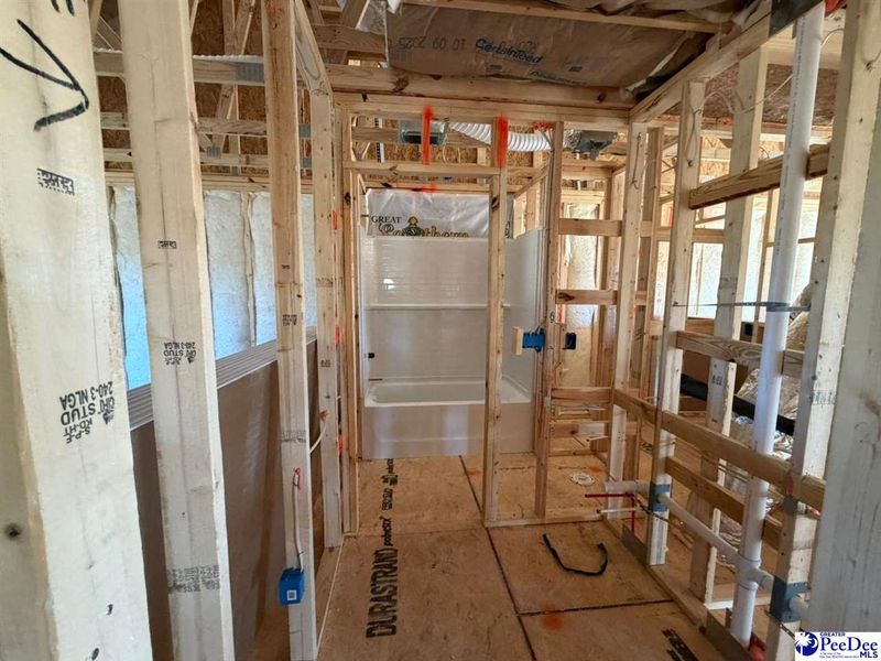 In-progress construction of a new home in The Grove, Florence, SC (Image 11).