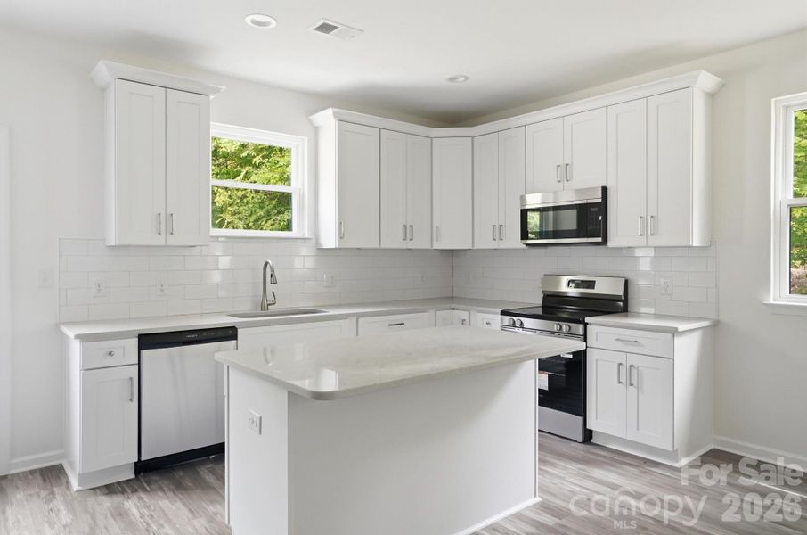 Furnished interior view inside a new home in , Statesville (Image 7).