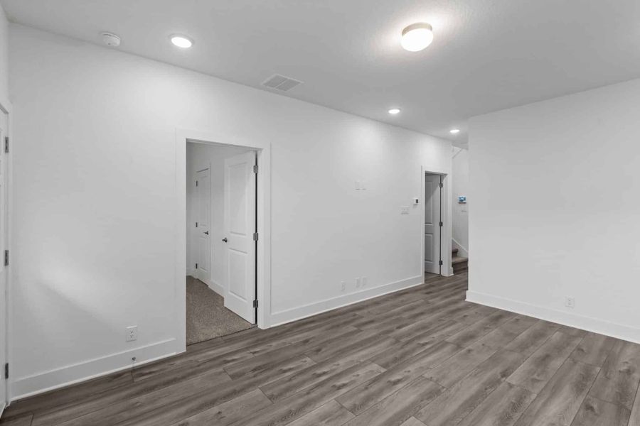 Spacious, unfurnished interior of a new home in Centero at Stone Oak, San Antonio (Image 24).