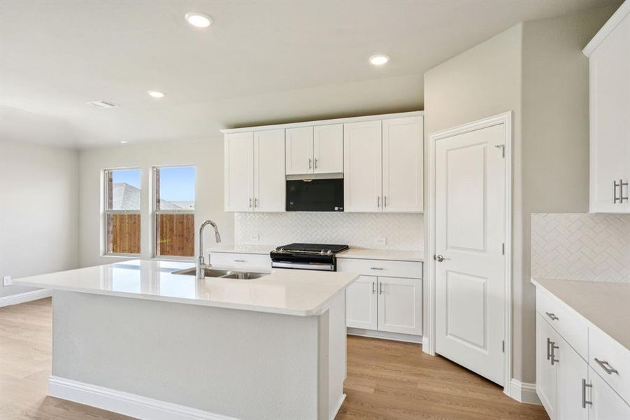 Photo is not of the actual home, but is an inspirational photo of builder’s model home and may depict options, furnishings, and/or decorator features that are not included.