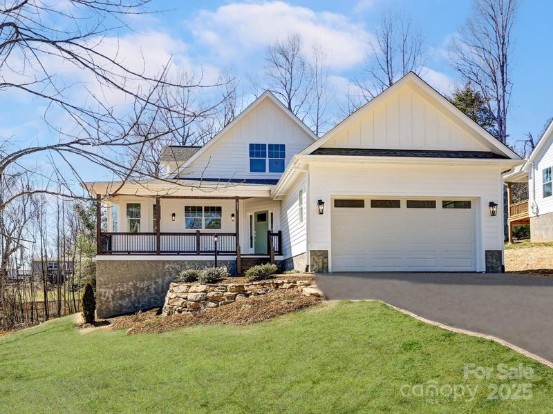 Front exterior of a new home in , Fletcher, NC, highlighting curb appeal (Image 1). Front exterior of a new home in , Fletcher, NC, highlighting curb appeal (Image 1).
