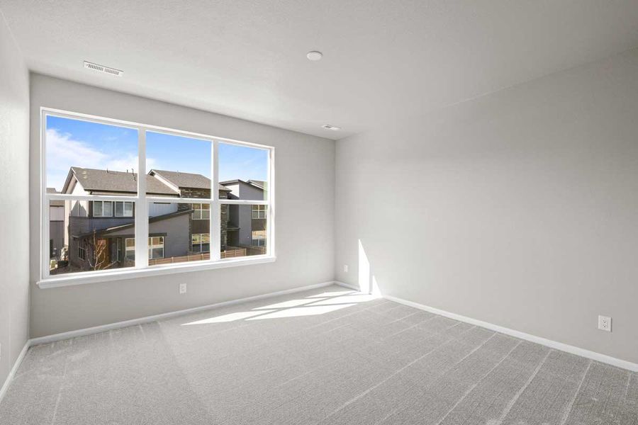 Spacious, unfurnished interior of a new home in Ralston Creek, Arvada (Image 17).
