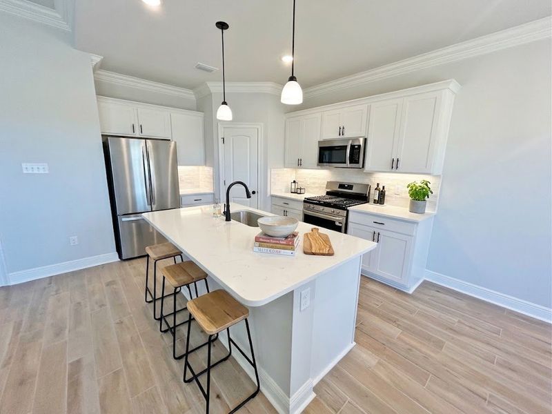 Furnished interior view inside a new home in The Bluffs at Lafayette, Freeport (Image 6).