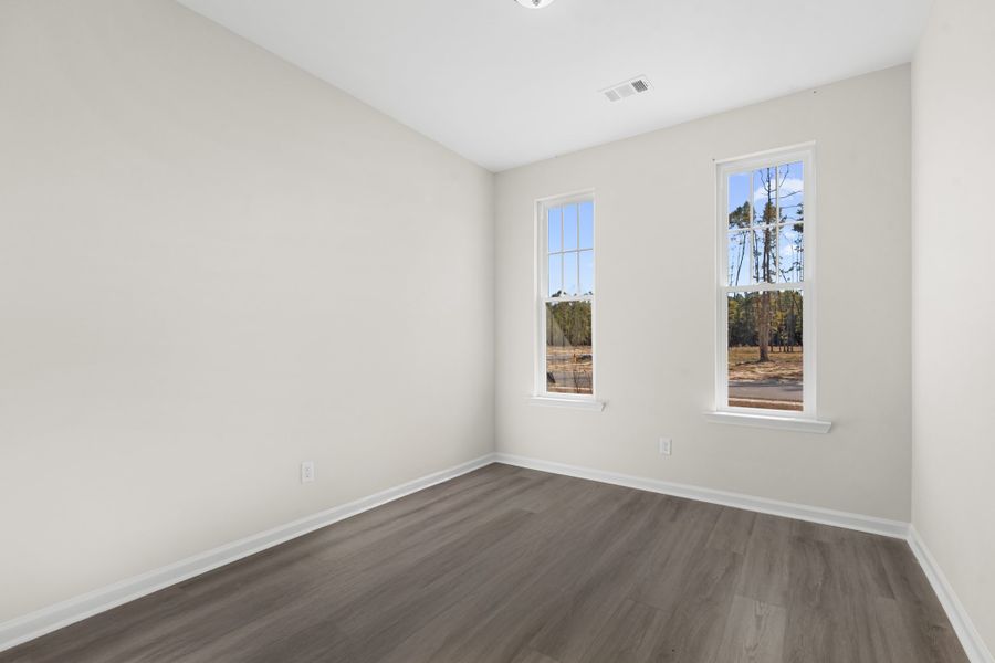 Representative unfurnished interior of a home built from the The Gwinnett by Smith Family Homes in Settlers Hammock, Kingsland (Image 35).
