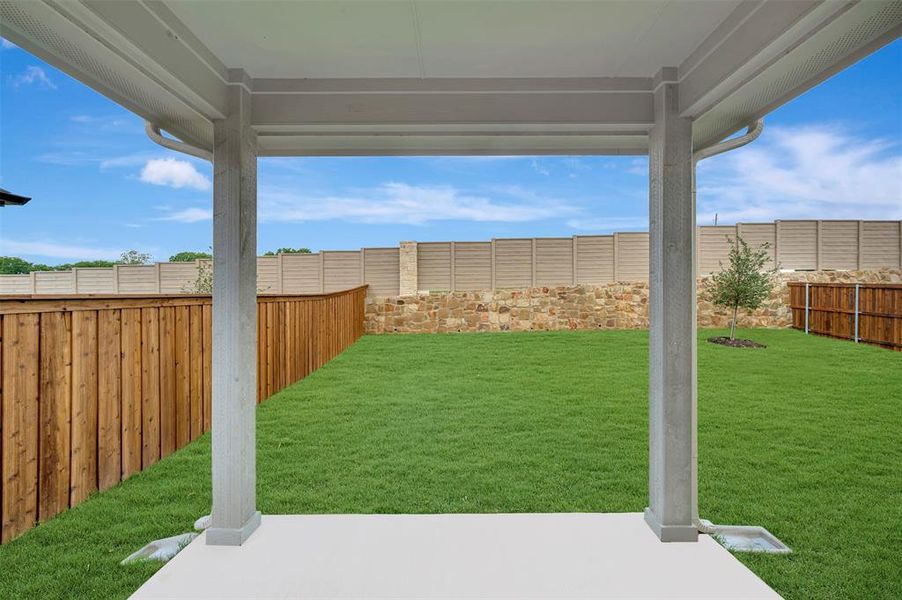 Exterior details and patio area of a home in Aspire at Reunion, Newark (Image 22).