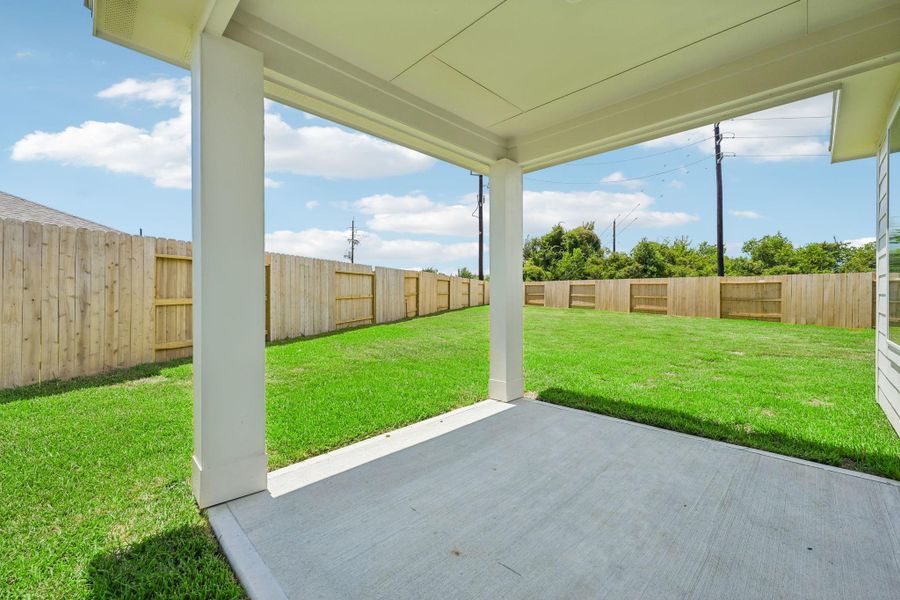Exterior details and patio area of a home in Heights of Barbers Hill, Baytown (Image 3).