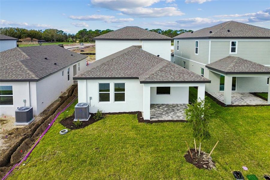 Exterior details and patio area of a home in Southpointe, Palmetto (Image 4).