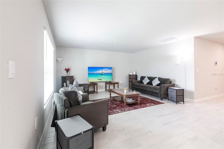 Furnished interior view inside a new home in , Port Charlotte (Image 6).