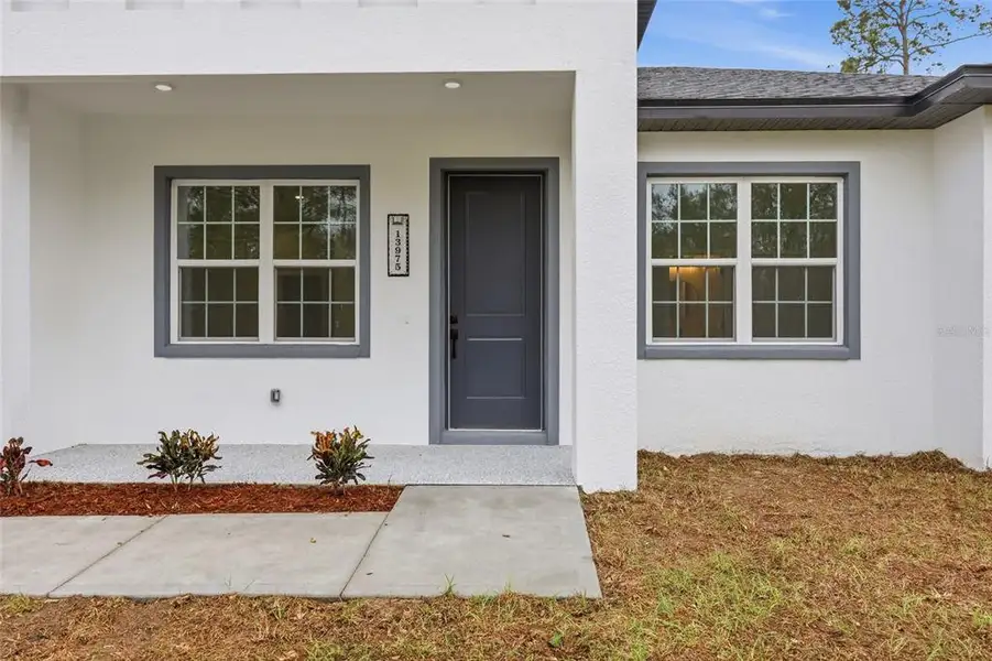 Exterior details and patio area of a home in , Ocala (Image 3).