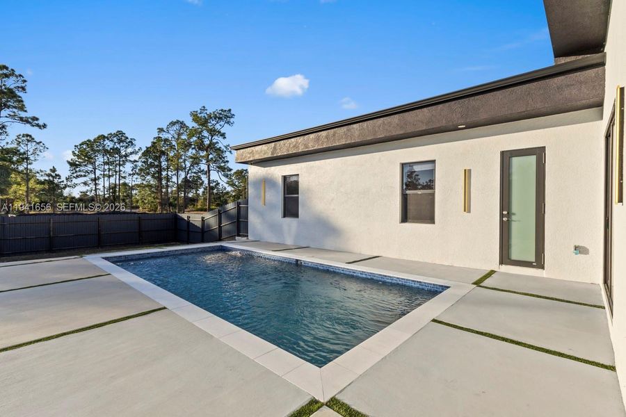 Exterior details and patio area of a home in , Lehigh Acres (Image 4).