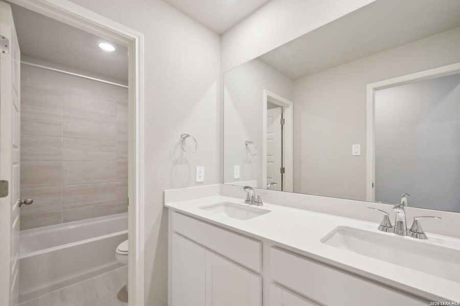 Furnished interior view inside a new home in Legendary Trails - Premier Series, Cibolo (Image 10).