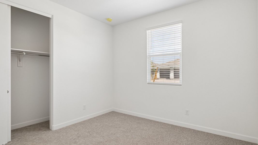 Spacious, unfurnished interior of a new home in Radiance at Superstition Vistas, Apache Junction (Image 29).