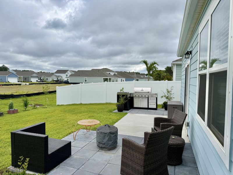 Exterior details and patio area of a home in Hillcrest, Ravenel (Image 3). Exterior details and patio area of a home in Hillcrest, Ravenel (Image 3).