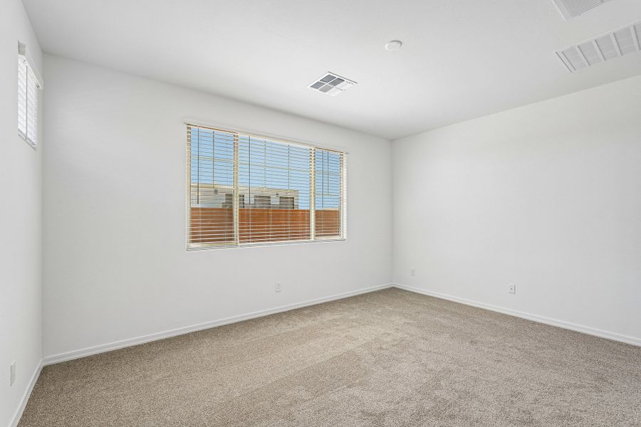 Spacious, unfurnished interior of a new home in Hawes Crossing, Mesa (Image 31).