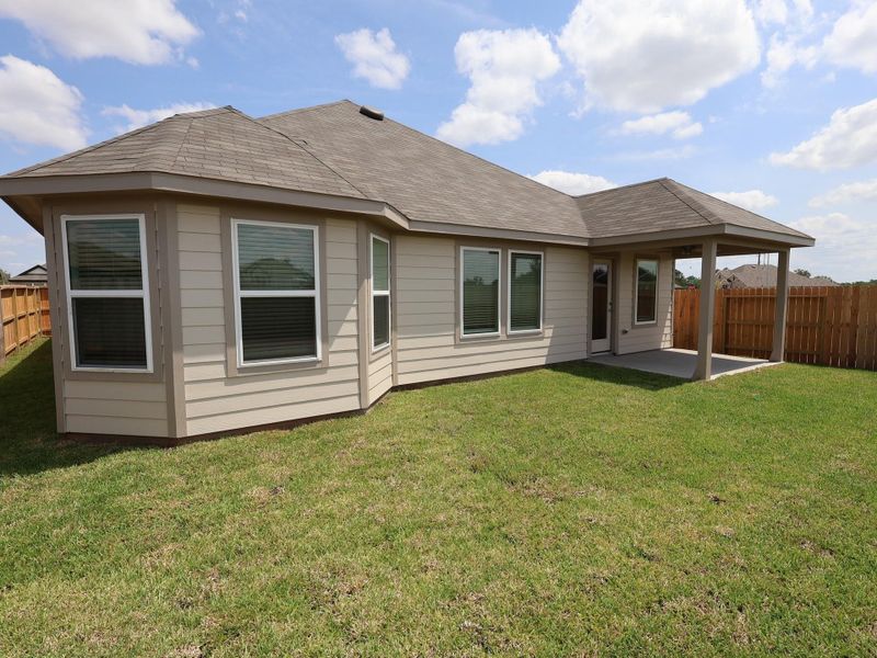Front exterior of a new home in Summerview, Fulshear, TX, highlighting curb appeal (Image 10). Front exterior of a new home in Summerview, Fulshear, TX, highlighting curb appeal (Image 10).
