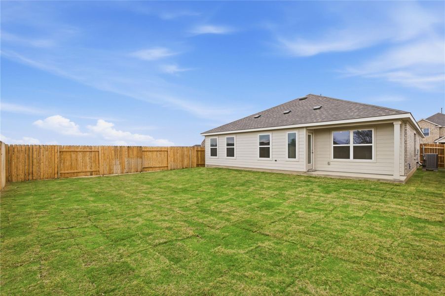 Exterior details and patio area of a home in Infinity Square, Kyle (Image 3).