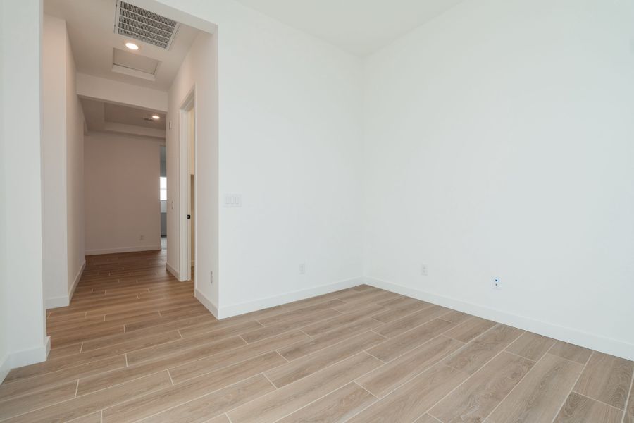 Spacious, unfurnished interior of a new home in Waterston Central, Gilbert (Image 13).