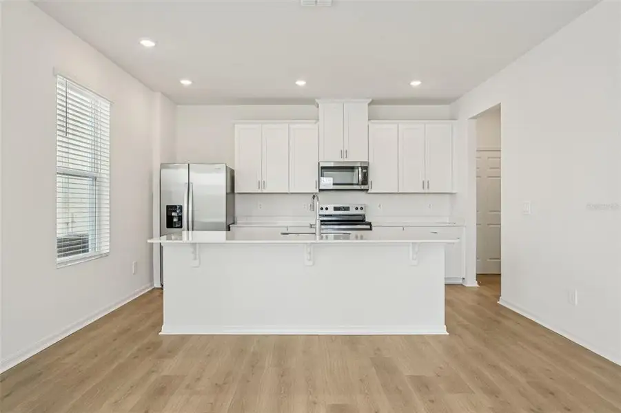 Furnished interior view inside a new home in The Meadow at Crossprairie Bungalows, St. Cloud (Image 6).