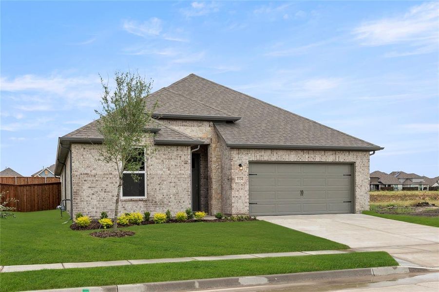 Front exterior of a new home in Creekside, Royse City, TX, highlighting curb appeal (Image 1).
