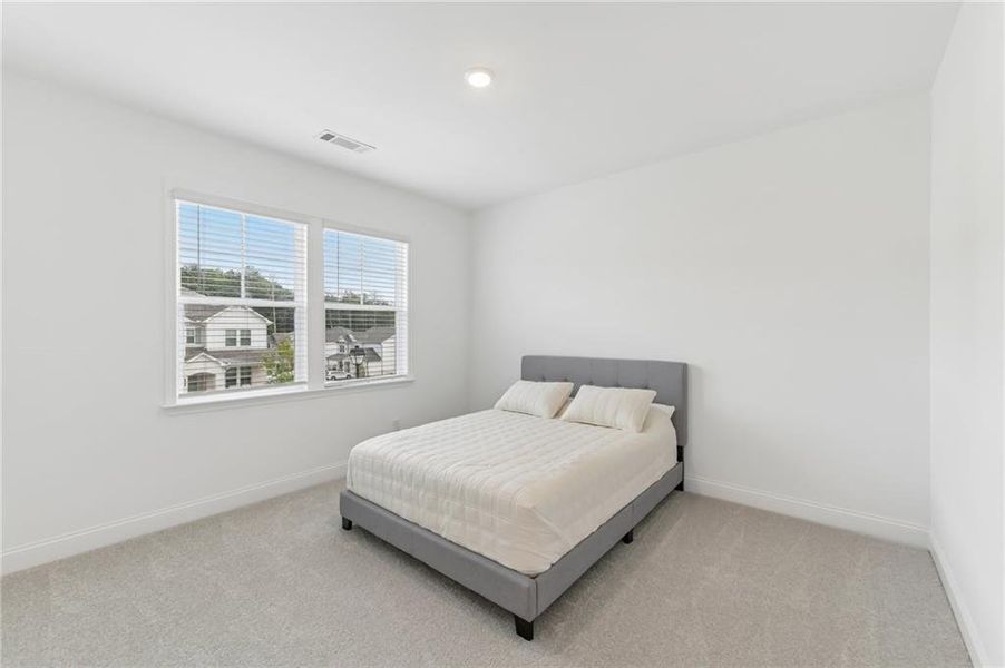 Furnished interior view inside a new home in Bailey Fence, Dacula (Image 30).