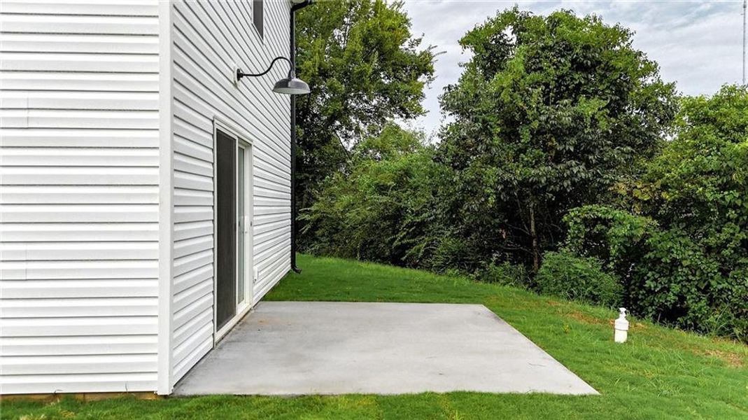 Front exterior of a new home in , Calhoun, GA, highlighting curb appeal (Image 20).