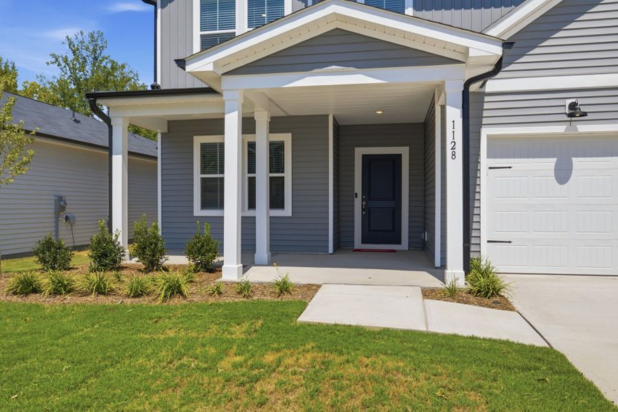 Exterior details and patio area of a home in Carpenter Falls, Durham (Image 4).