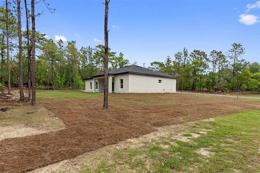Exterior details and patio area of a home in , Citrus Springs (Image 22).