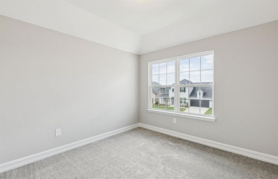 Secondary bedroom with large windows