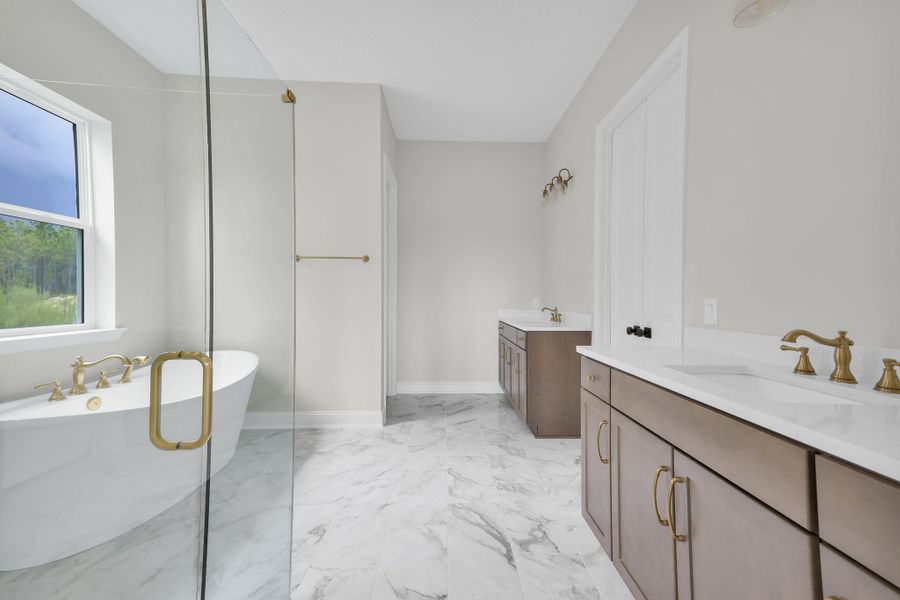 Representative furnished interior of a home built from the Avondale by Riverside Homes in Hidden Creek at SilverLeaf 80' Series, St. Augustine (Image 14).