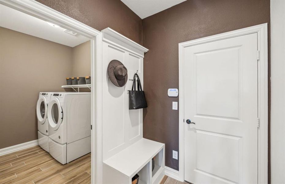 *actual home, furniture not included - Mud Room and Laundry room with storage space