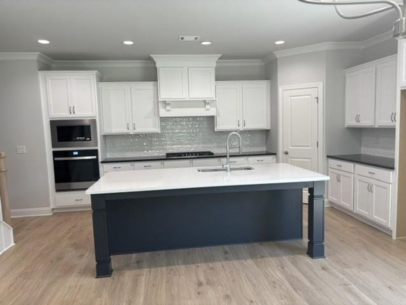 Furnished interior view inside a new home in , Suwanee (Image 6). Furnished interior view inside a new home in , Suwanee (Image 6).