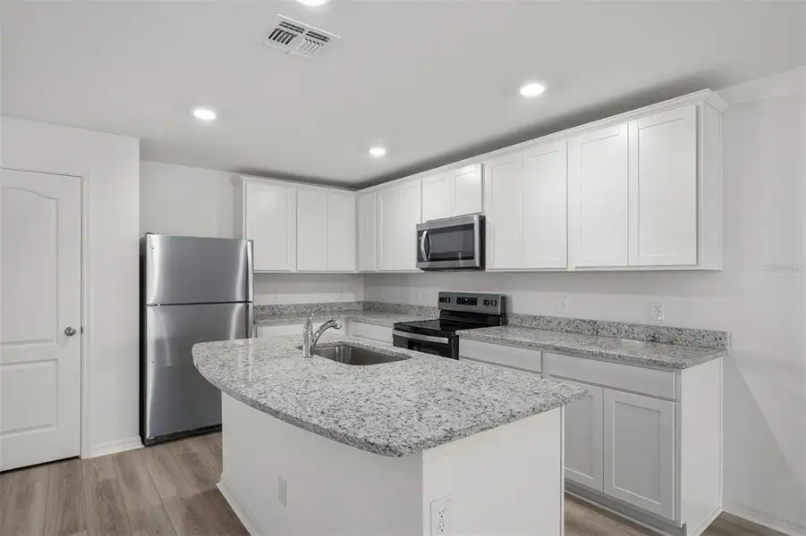 Furnished interior view inside a new home in Gum Lake Preserve, Lake Alfred (Image 7).