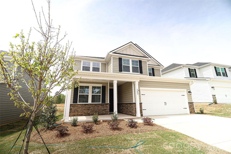 Front exterior of a new home in , Denver, NC, highlighting curb appeal (Image 18).