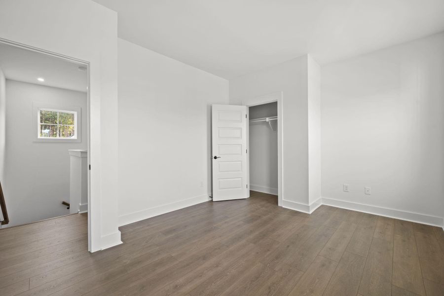 Spacious, unfurnished interior of a new home in The Domus Collection at Midtown Nexton, Summerville (Image 40).