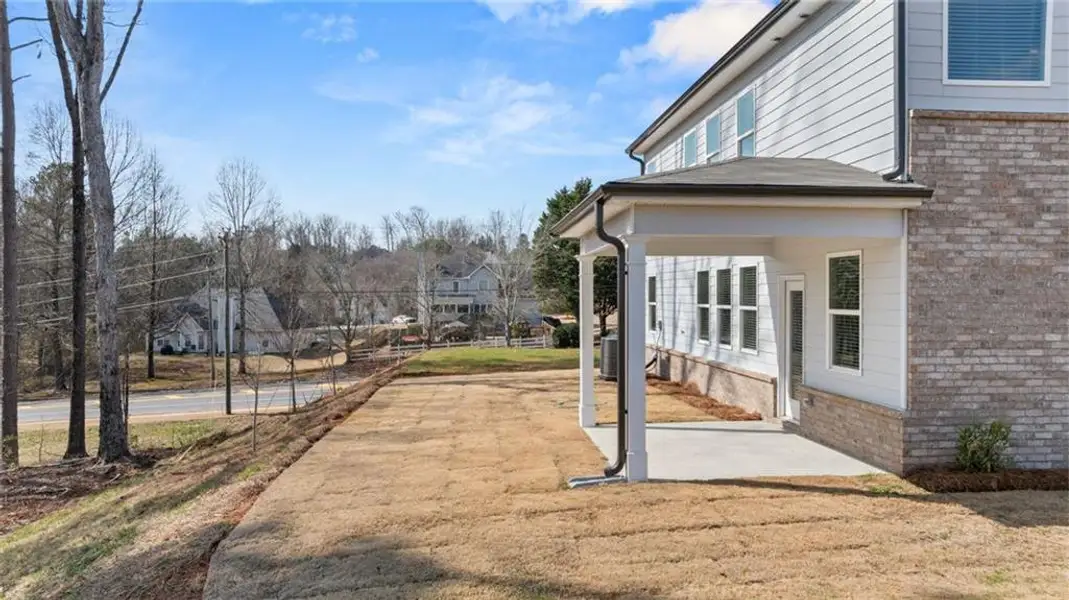 Exterior details and patio area of a home in Hillbrooke Preserve, Conyers (Image 26).