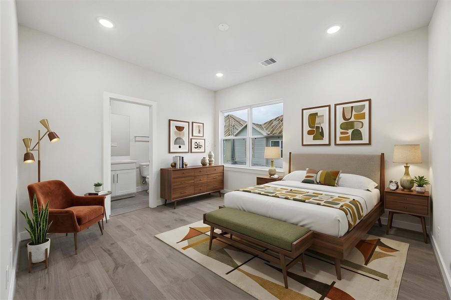 secondary bedroom on 3rd level with private bathroom.