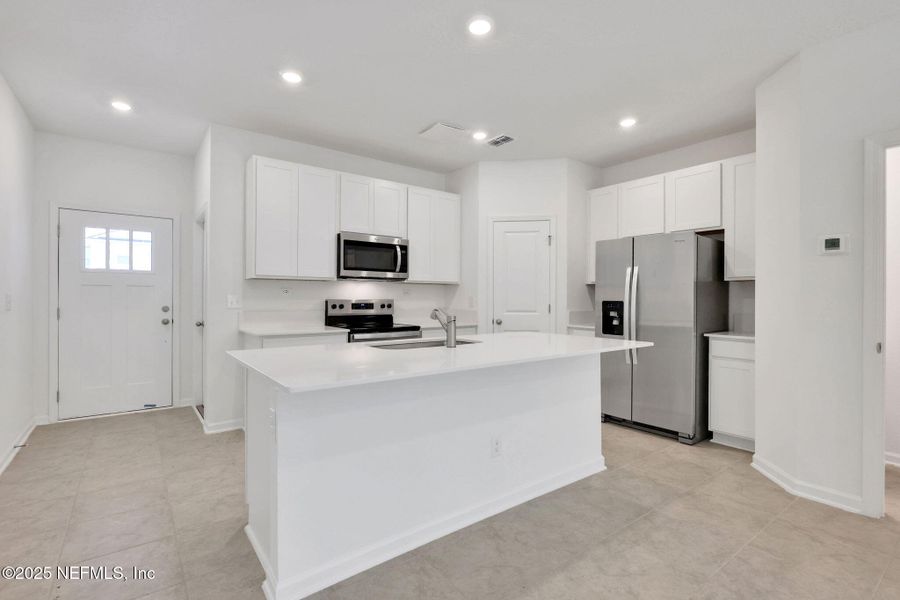 Furnished interior view inside a new home in Atlantis Pointe, Middleburg (Image 6).