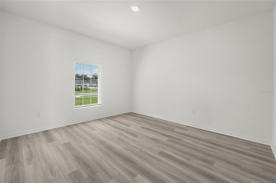 Spacious, unfurnished interior of a new home in Tula Parc, Astatula (Image 12).