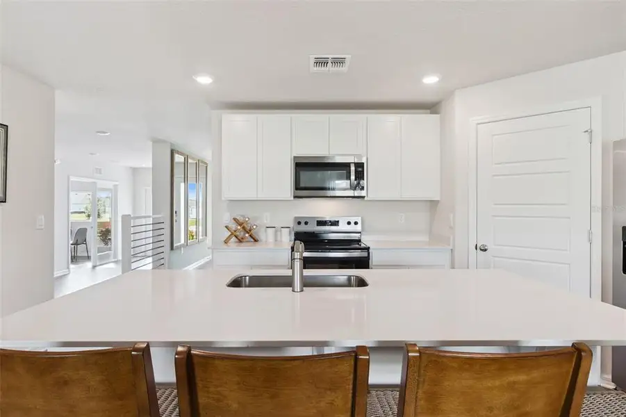 Furnished interior view inside a new home in Magnolia Pointe, Umatilla (Image 27).