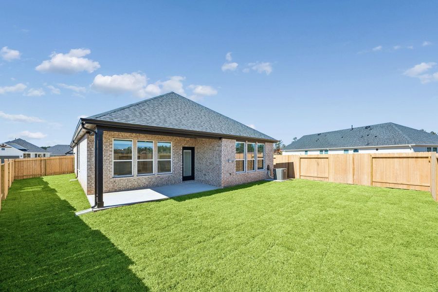 Exterior details and patio area of a home in Montgomery Bend, Montgomery (Image 3).