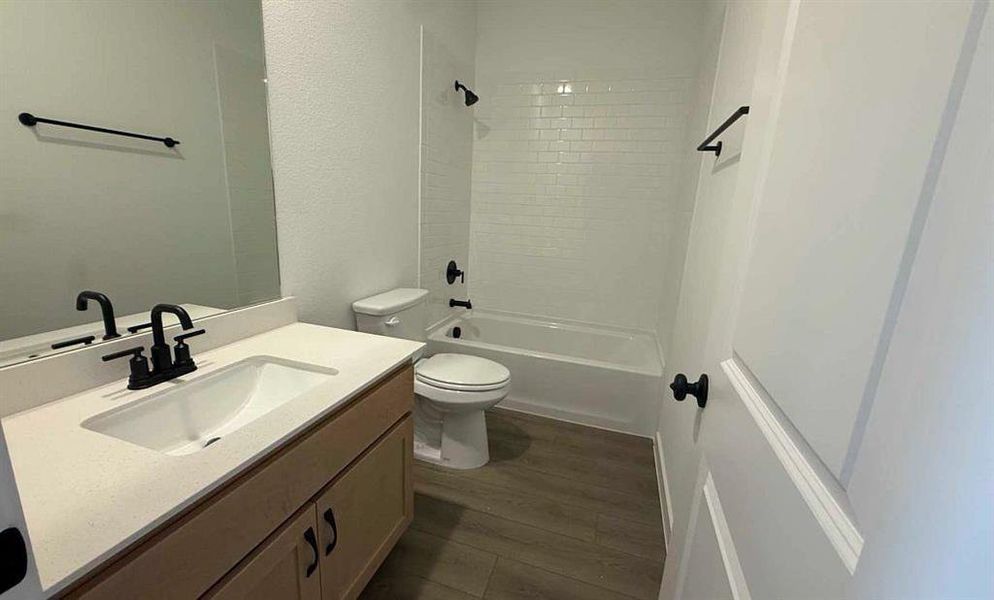 Furnished interior view inside a new home in Collin Creek, Plano (Image 4).