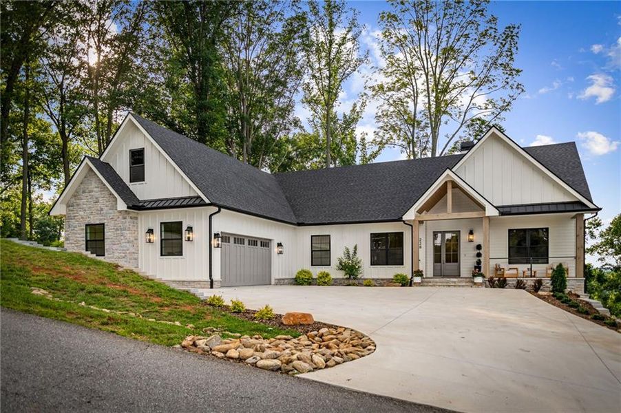 Front exterior of a new home in , Blairsville, GA, highlighting curb appeal (Image 26). Front exterior of a new home in , Blairsville, GA, highlighting curb appeal (Image 26).