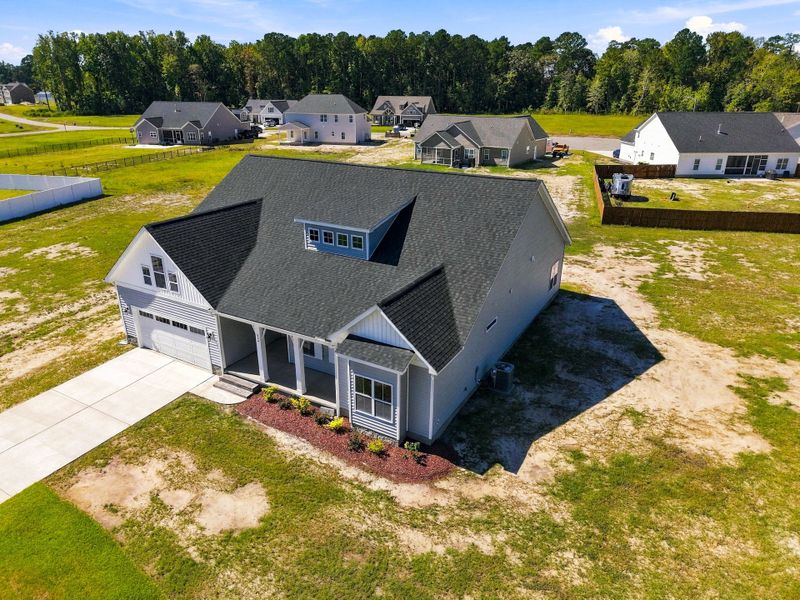 Front exterior of a new home in Laurel Oaks, Greenville, NC, highlighting curb appeal (Image 29).