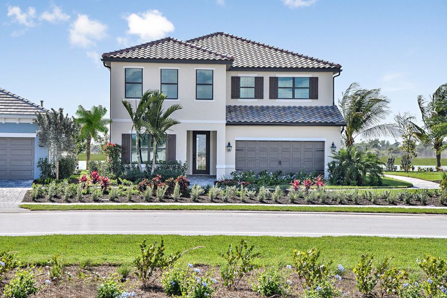 Representative exterior photo of a completed home built from the Artistry by Neal Communities in SkySail, Naples, FL (Image 2).