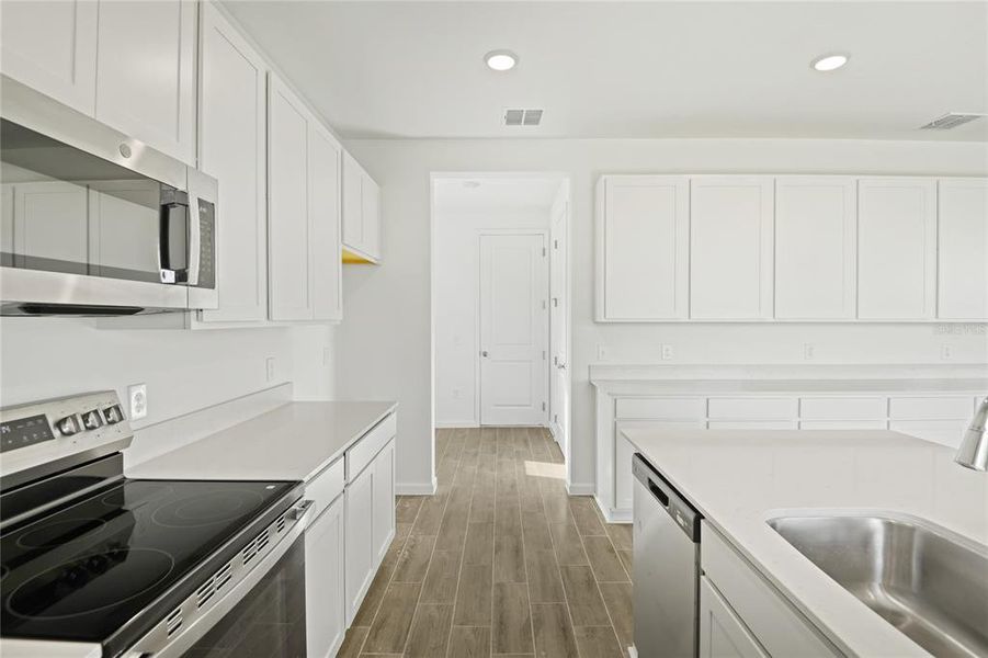 Furnished interior view inside a new home in Seasons at Scenic Terrace, Lake Hamilton (Image 9). Furnished interior view inside a new home in Seasons at Scenic Terrace, Lake Hamilton (Image 9).